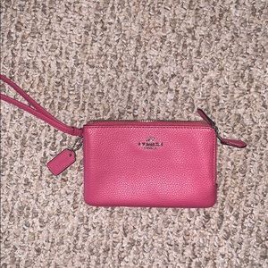 Pink coach wristlet